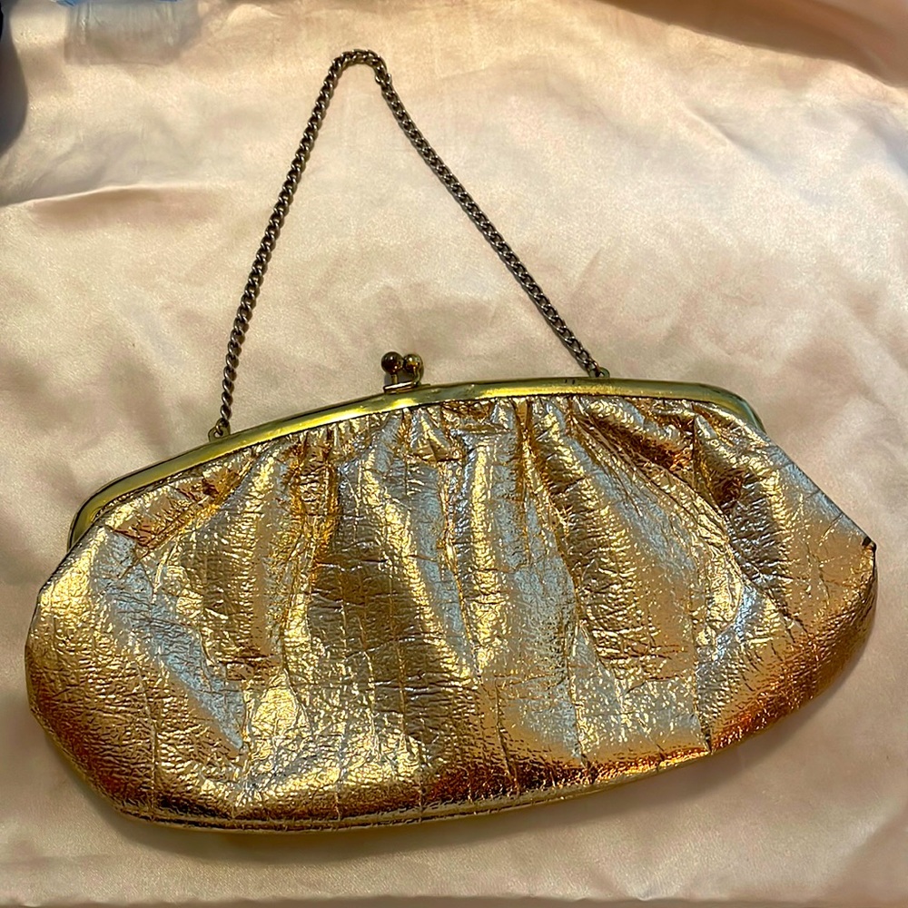 Vintage “budd” gold leather clutch bag